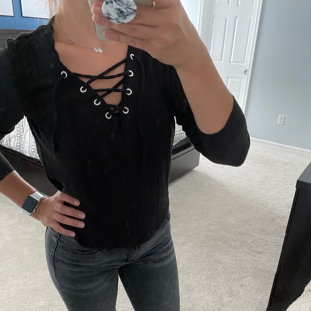 Black long sleeve shirt with fun front detailing